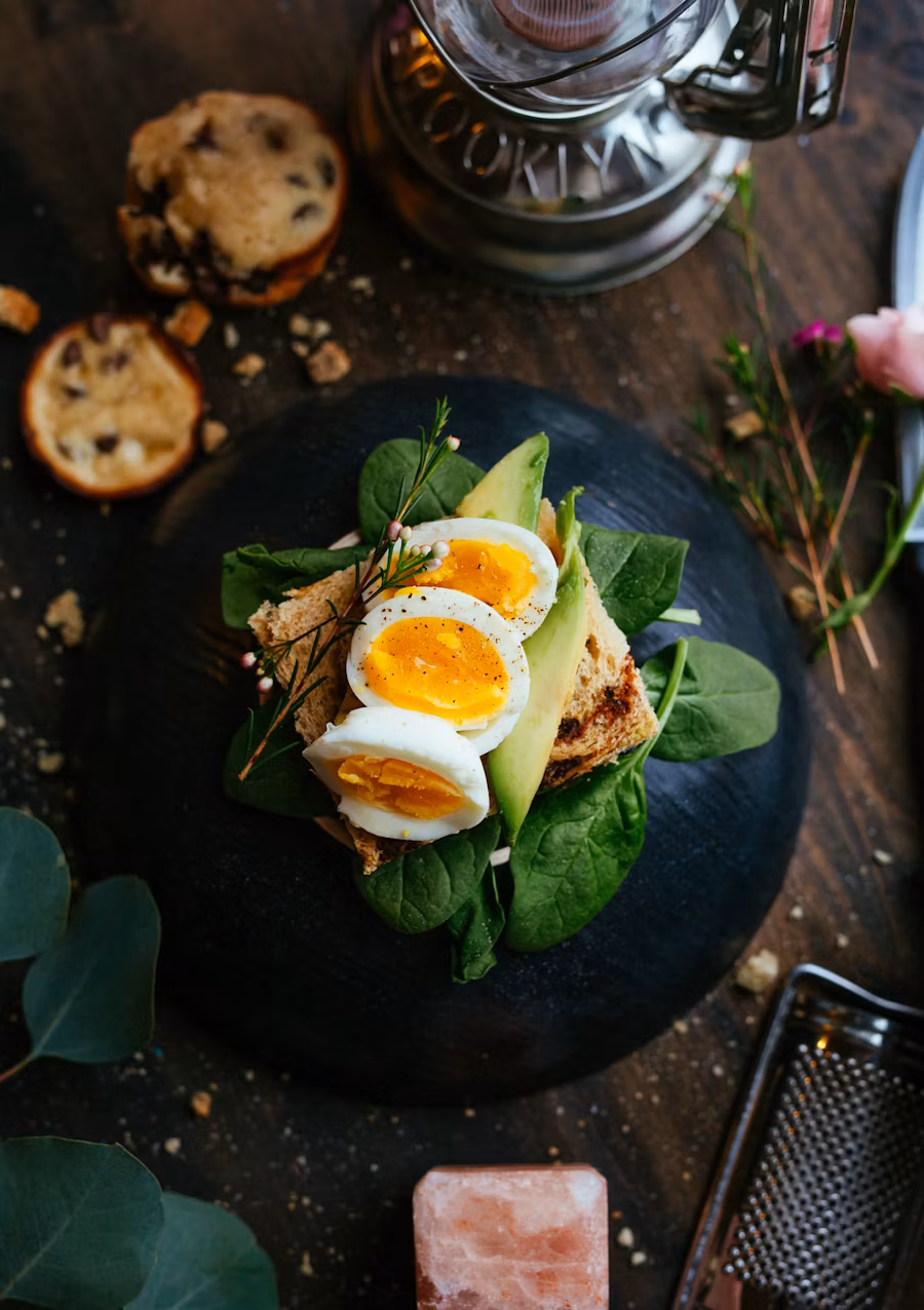 Mediterranean feast with various dishes on rustic wooden table