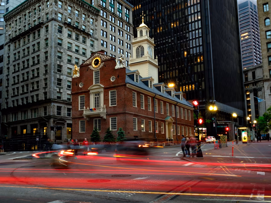 Guide in period costume leading Freedom Trail tour